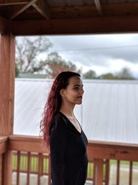 Woman standing in gazebo