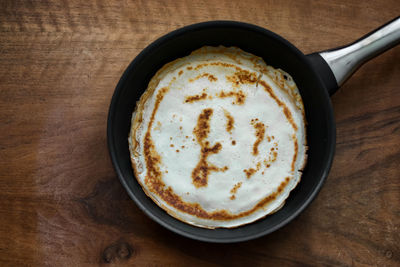 High angle view of cappuccino on table