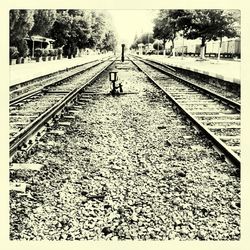 Railway tracks against clear sky