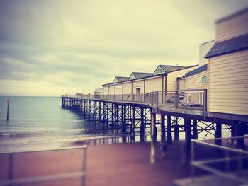 Pier on sea against sky