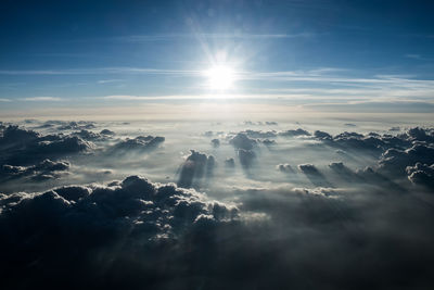 Sun shining through clouds