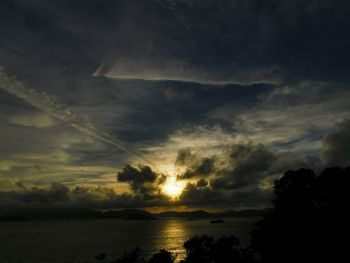 Scenic view of dramatic sky over sea during sunset