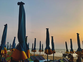 Panoramic view of beach against sky during sunset