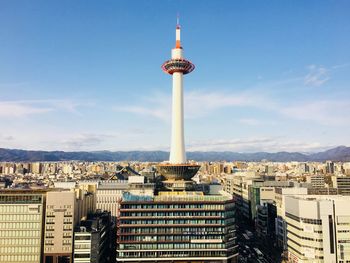 Communications tower in city