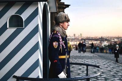 Woman standing in city