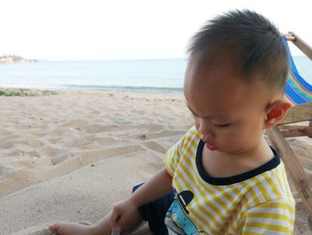 Cute boy on beach