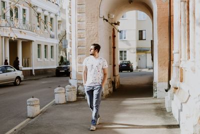 Full length of man standing in building