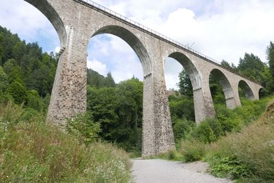 Low angle view of bridge against sky