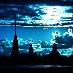 Building against cloudy sky at dusk