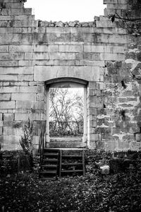 Brick wall with closed door