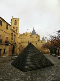 Buildings against sky