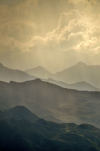 Scenic view of mountains against sky during sunset