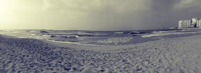 Scenic view of beach against sky