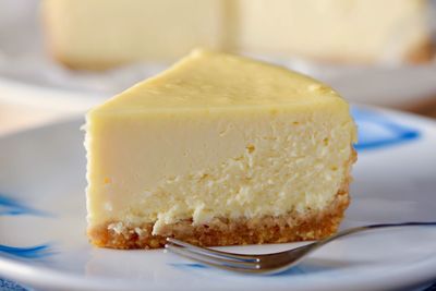 Close-up of cheesecake served on table