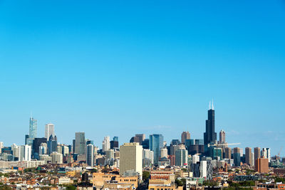 Cityscape against blue sky