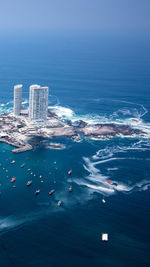 Aerial view of buildings at sea