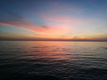 Scenic view of sea against dramatic sky