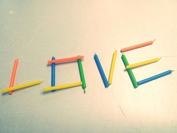 High angle view of colored pencils on table