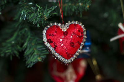 Close-up of heart shape hanging on tree