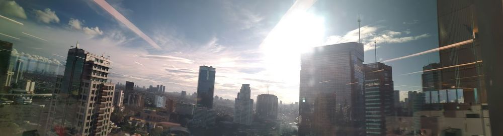 Panoramic view of buildings against sky