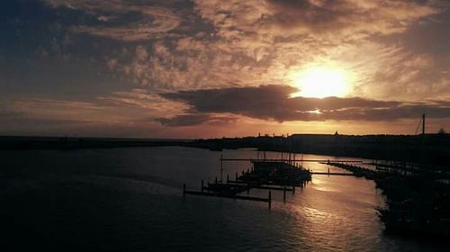 Scenic view of sunset over river