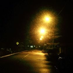 Street light on road at night