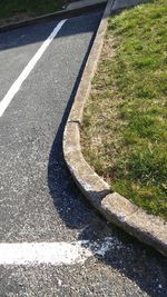 High angle view of footpath by road