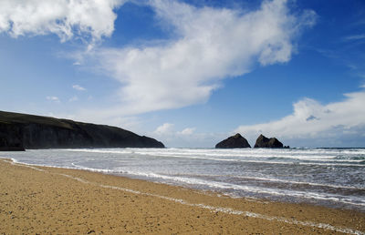 Scenic view of beach against sky