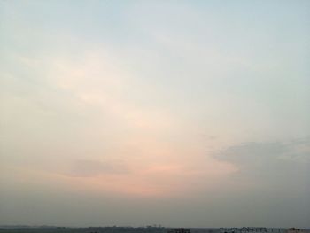 Scenic view of landscape against sky during sunset