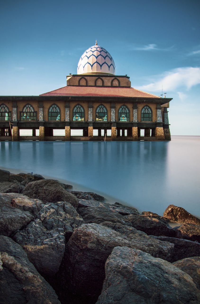 VIEW OF BUILDING BY SEA