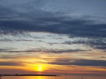 Scenic view of dramatic sky during sunset