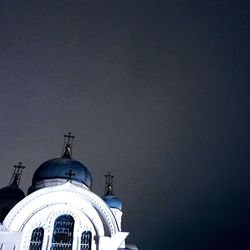 Low angle view of church and building against sky