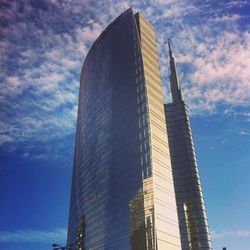 Low angle view of skyscrapers against sky