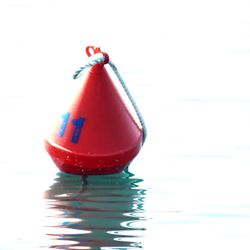 Close-up of red boat on sea