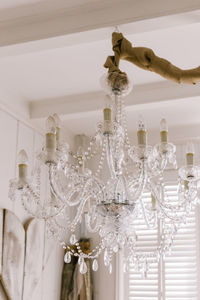 Chandelier hanging from ceiling at home