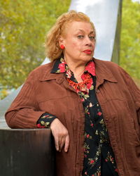 Portrait of senior woman standing outdoors