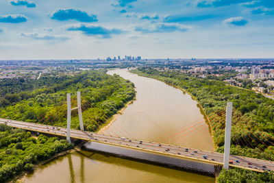 Drone view landscape highway bridge over river. areal view city road landscape. warsaw. europe