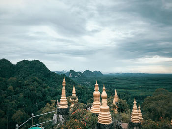 Panoramic view of temple against cloudy sky