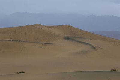 Scenic view of desert against sky