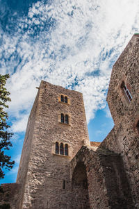 Low angle view of historic building against sky