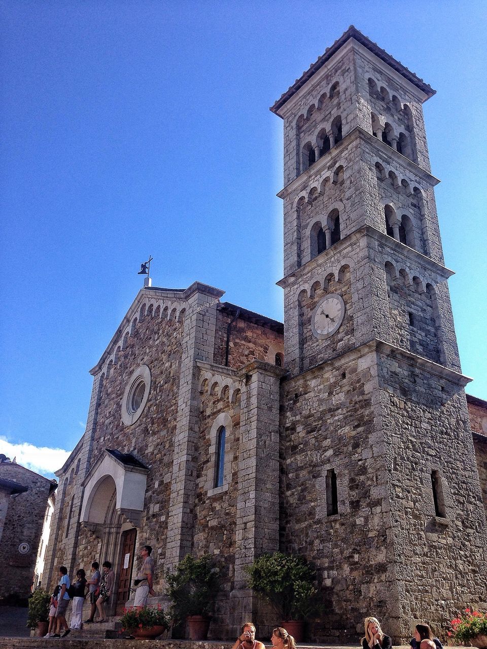 architecture, building exterior, built structure, clear sky, low angle view, religion, blue, place of worship, church, history, spirituality, tower, famous place, old, travel destinations, clock tower, travel, tourism