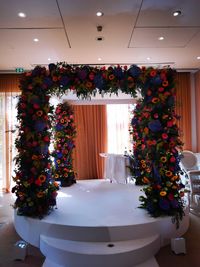 Potted plants on table in illuminated room