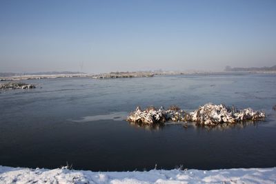 Scenic view of sea against clear sky