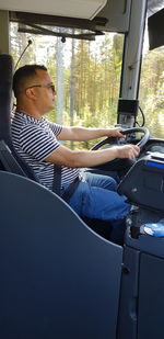 Man sitting in car