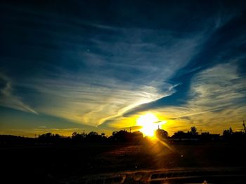 Scenic view of dramatic sky during sunset