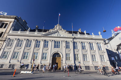 Group of people in front of building