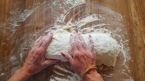 Close-up of person hand in water