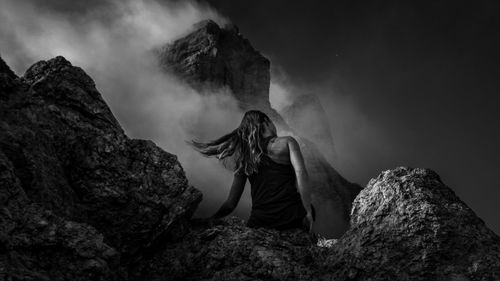 Self portrait in mountains of dolomites during adventurious hiking trip