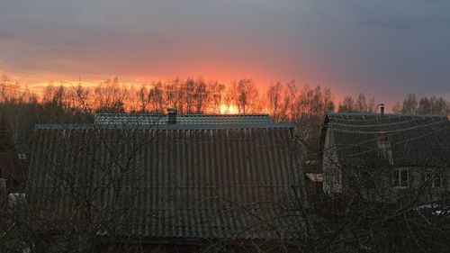 Scenic view of field against sky during sunset
