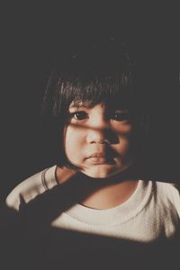 Close-up portrait of young woman